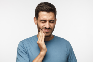 a dental patient experiencing tooth pain